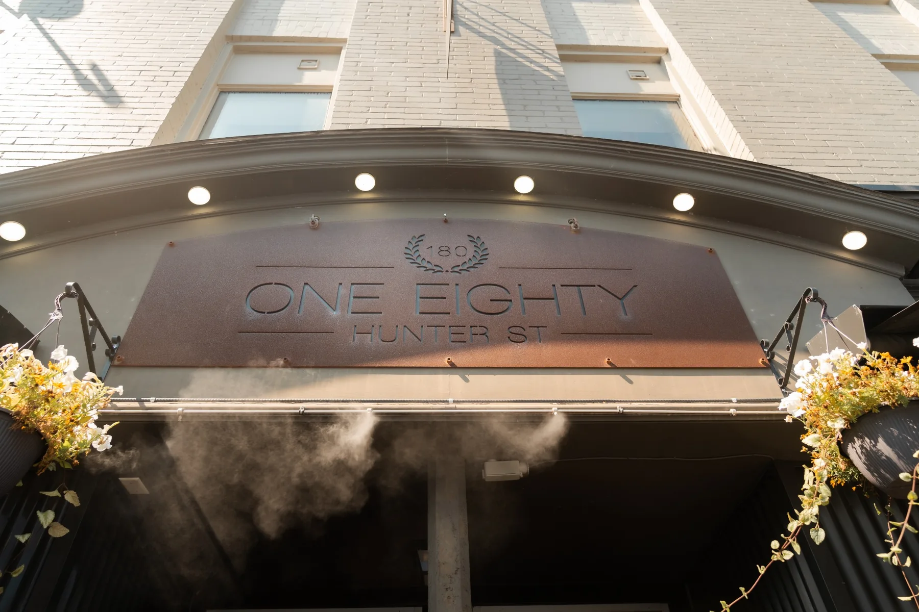 One Eighty Hunter Street exterior entrance and sign